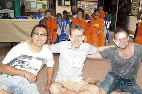 CMLocals Chiang Mai Locals Temple Etiquette tourists respectfully seated with monks in temple environment